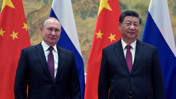 Putin, Çin'de Şi tarafından karşılandı