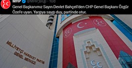 MHP'den Özel'e 'uyarı': Yargıya saygı duy, partinde otur