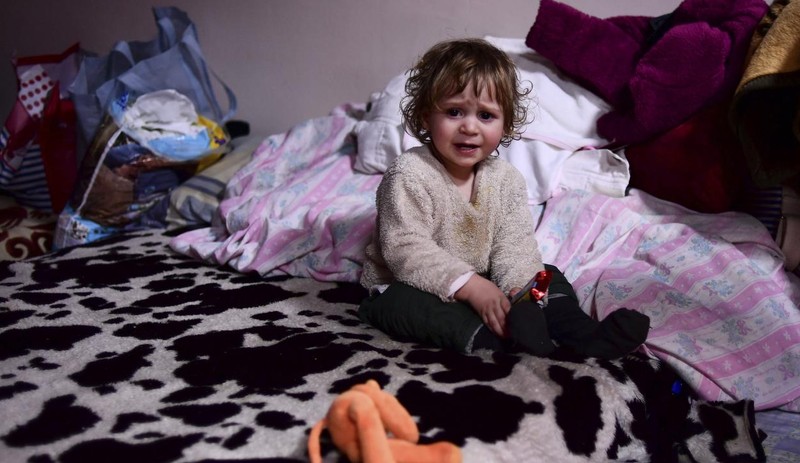 Savaş ilk onları vuruyor: Ukrayna'da çocuklar yollarda, hastanelerde yaşam mücadelesi veriyor - Resim : 21